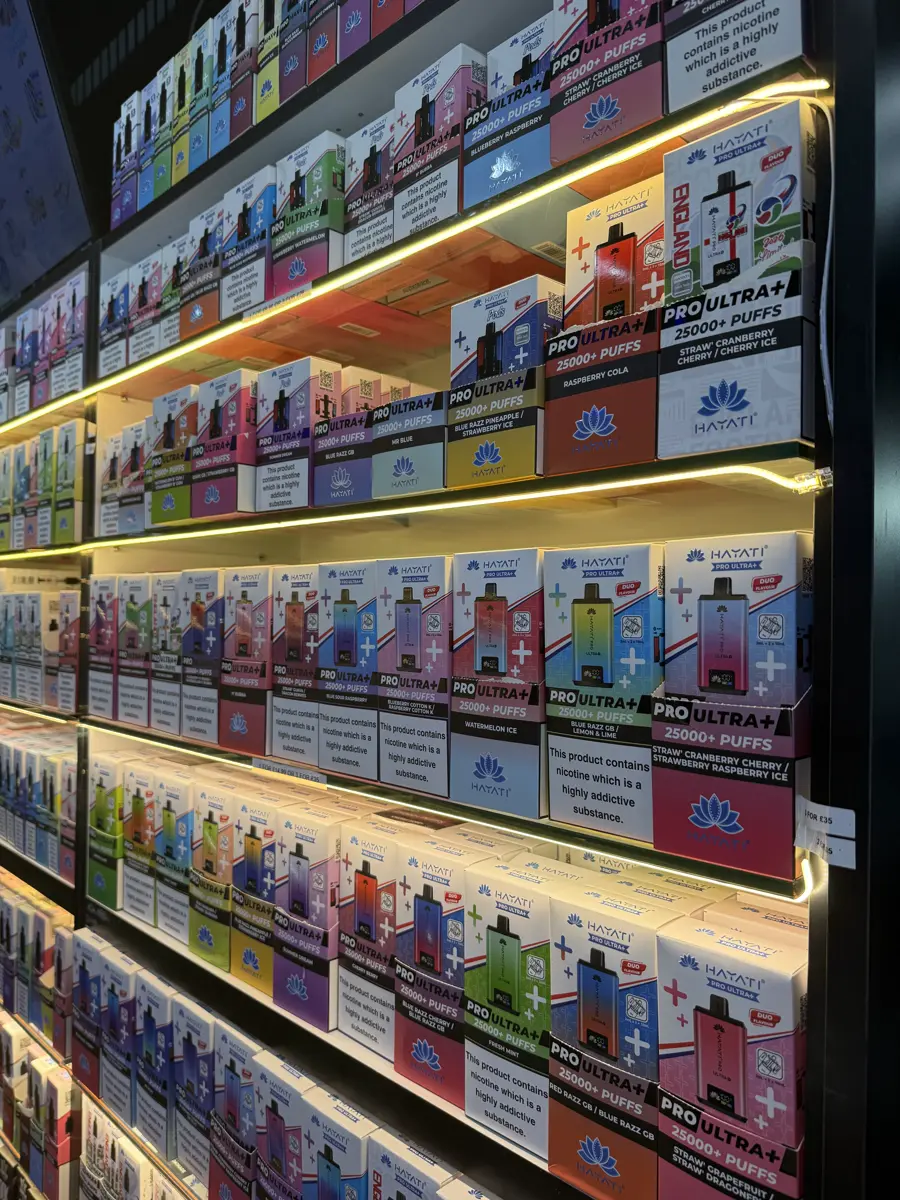 The big-puff wall — shelves stacked with kits